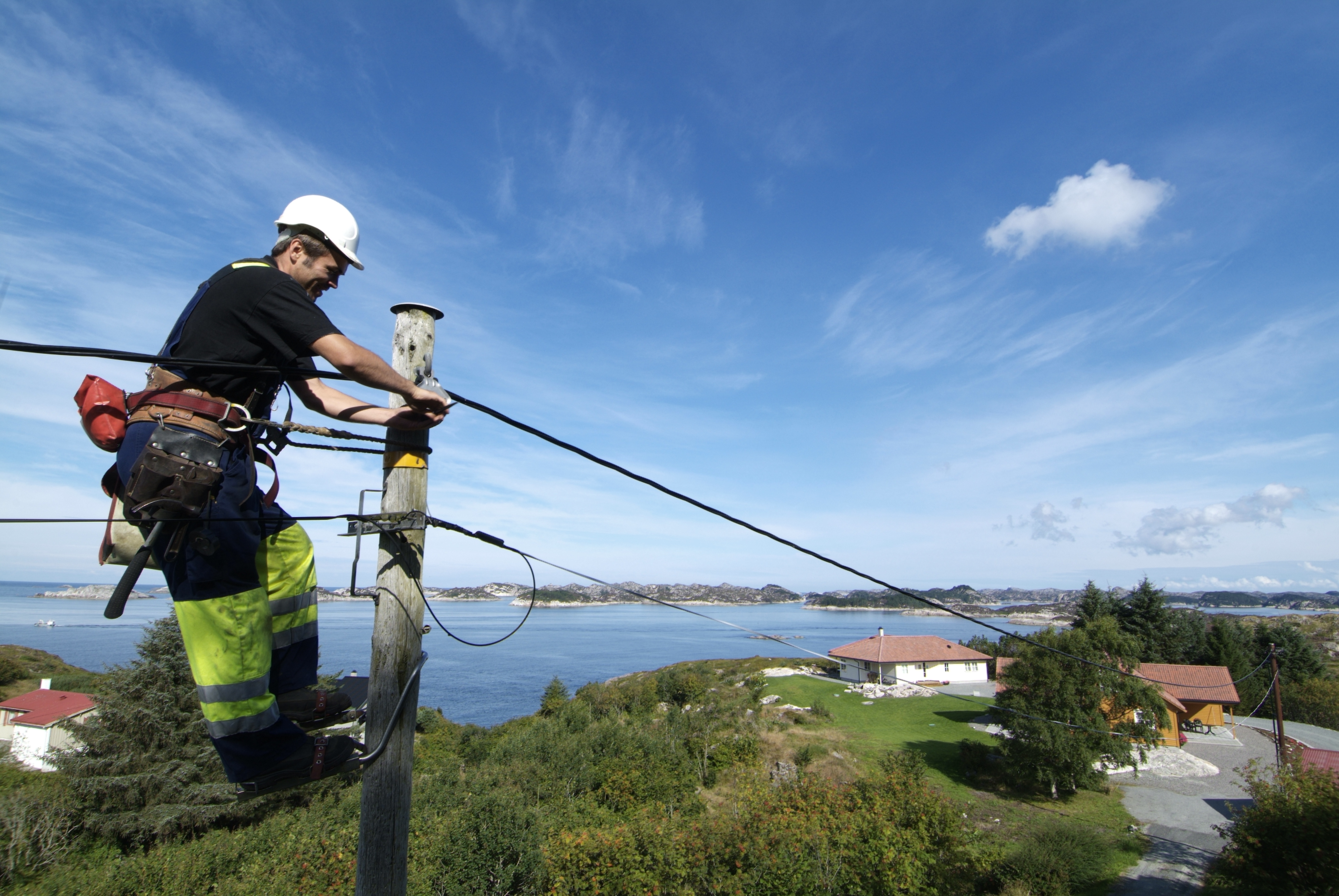 Montør i toppen av stolpe